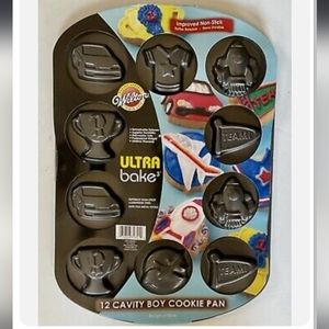 👉*NWT* WILTON ULTRA BAKE 12 CAVITY (6) DESIGN COOKIE PAN ~ROCKET, TROPHY, CARS